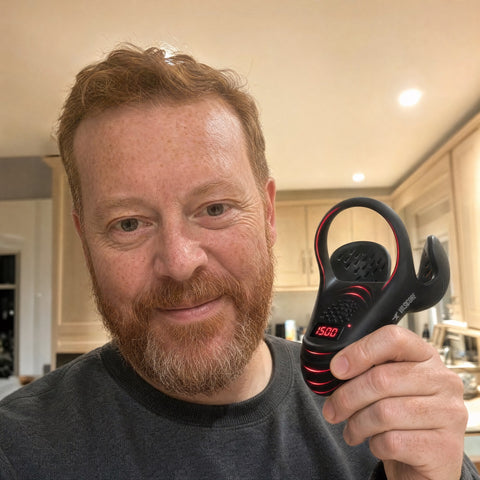 VasoCore customer holding the device