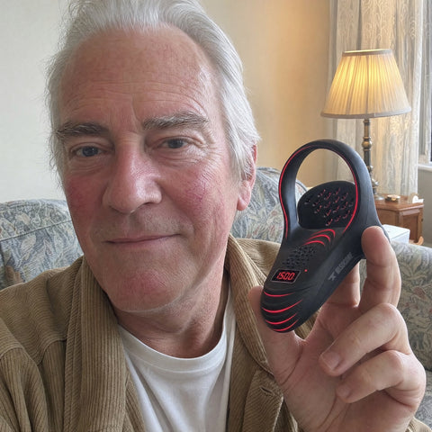 VasoCore customer holding the device