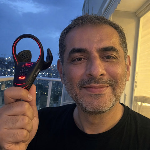 VasoCore customer holding the device
